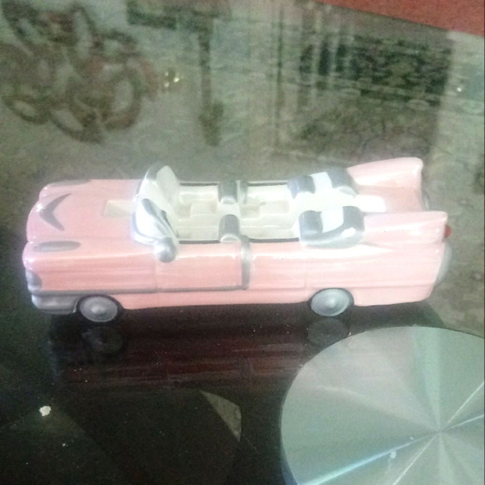 Pink ceramic mary kay business card holder.